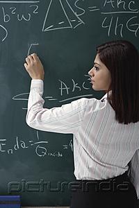 PictureIndia - Woman at chalk board