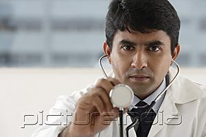 PictureIndia - doctor holding up stethoscope