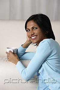 PictureIndia - woman relaxing with a mug