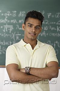 PictureIndia - young man arms crossed