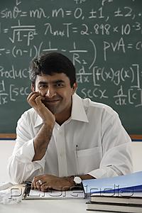 PictureIndia - teacher sitting at his desk