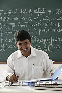 PictureIndia - teacher sitting at desk