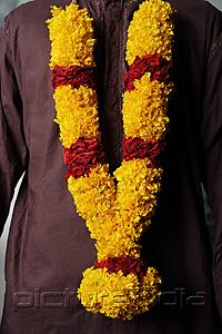 PictureIndia - Man wearing flower garlands.
