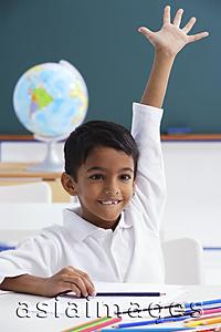 Asia Images Group - boy raises his hand excitedly