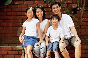 AsiaPix - Family with two children, looking at camera, portrait