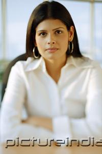 PictureIndia - Female executive, looking at camera, portrait