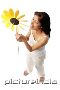 PictureIndia - Woman holding pinwheel