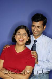 PictureIndia - Couple laughing, facing camera