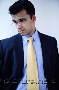 PictureIndia -  Businessman looking away