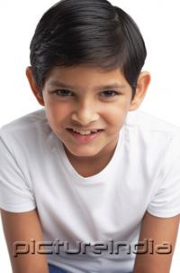 PictureIndia - Boy looking at camera, head shot
