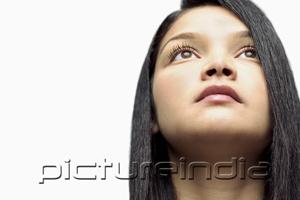 PictureIndia - Woman looking up, head shot